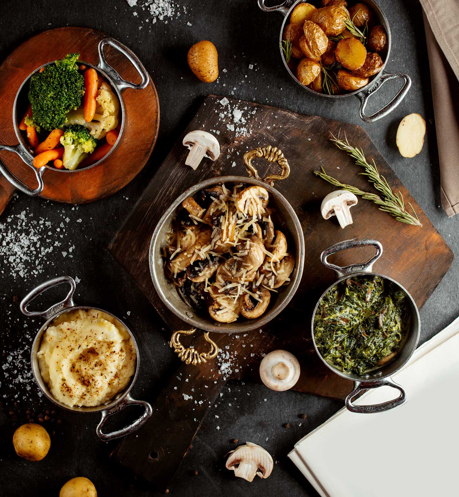 top-view-pans-with-mushroom-sautee-mashed-potato-sabzi-boiled-vegetables-roasted-potatoes top-view-pans-with-mushroom-sautee-mashed-potato-sabzi-boiled-vegetables-roasted-potatoes